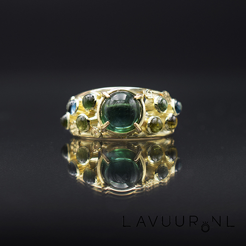 gouden ring met toermalijnen en topaas